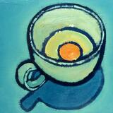 An egg in a coffee cup