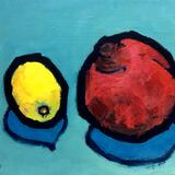 A lemon and a pomegranate