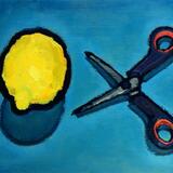 A lemon and a pair of scissors