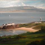 A view of Stroove Beach and Lighthouse, showing yachts and a fishing boat and Mt. Benevenagh and Magilligan Strand across the Foyle. 
