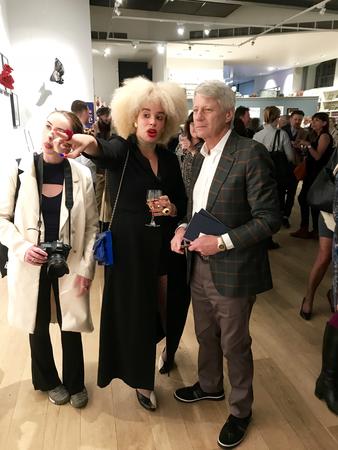 Sadie Clayton & Nick Ross pointing out Peter Vaillant's artwork