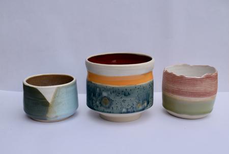 3 Decorated pots, the red and green one has a deliberately hand cracked rim (ok I broke it first!)