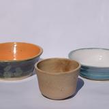 Some of my first pots, a bit wonky.