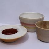 A little top hat pot, plain striped bowl and a little dromedary glaze pot