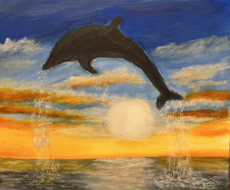Dolphin jumping out of the water. 
