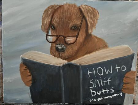 Dog reading a book