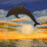 Dolphin jumping out of the water. 