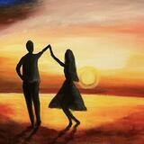 Couple dancing on the beach at sunset 