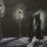 Couple dancing in the snowy night 