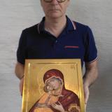 Holding The Vladimir Icon