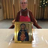 Iconostasis student Joan with completed Mother of God of Victories Icon