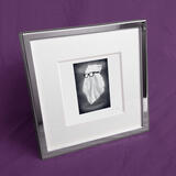 1 x The ghost of Eric Morecambe toatie.