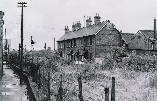 Cottages by railway. Abandoned