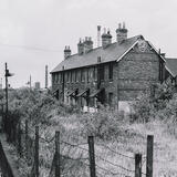 Cottages by railway. Abandoned
