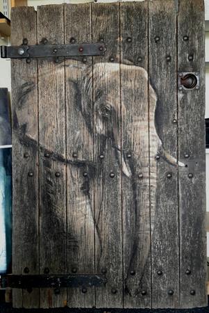 Elephant painted on pub cellar door (heat as an elephant )