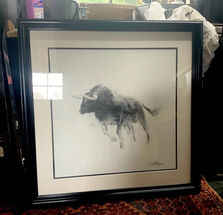 Framed charging bull