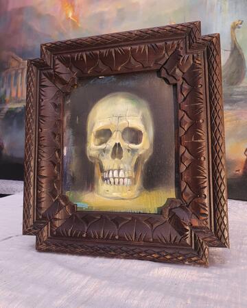 Small framed skull  the curio , oil painting on panel in antique carved frame 