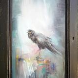 Raven on graffiti,  through window 