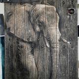 Elephant painted on pub cellar door (heat as an elephant )
