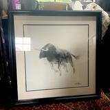 Framed charging bull
