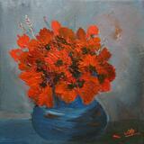 Blue bowl of red poppies