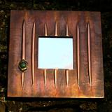 copper and aventurine mirror