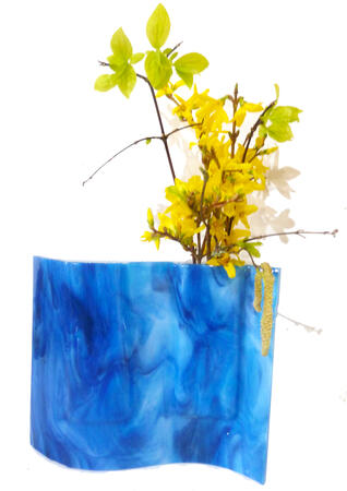 Egyptian blue 'Flower pocket' on wooden base