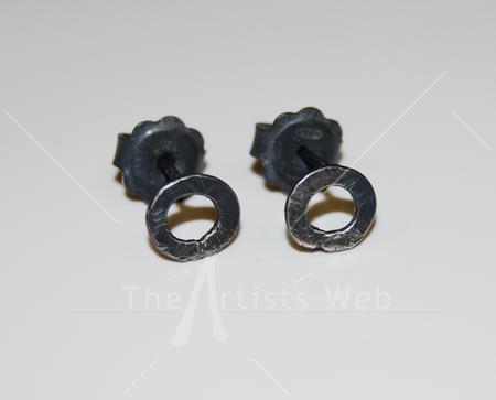 black little circular studs