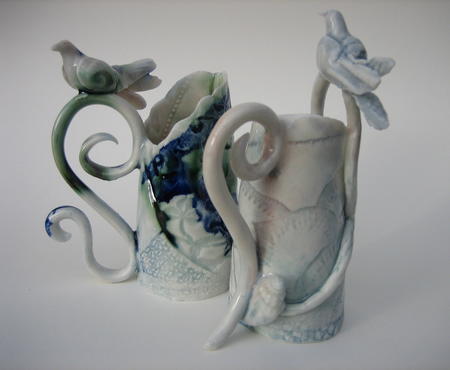 2 small porcelain vessels with perching birds