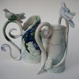 2 small porcelain vessels with perching birds