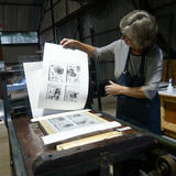 dru looking at print