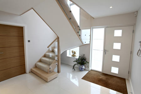 Contemporary Stair made from maple and glass with stainless steel fittings