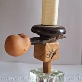 Spinning in a cold hard world, armless legless and lost her bottle. 