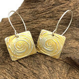 SOLD. Swirl Patterned 24ct Highlighted Silver earrings