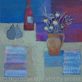 Seed heads and wine bottle