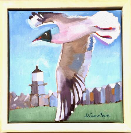 Black Headed Gull flying over the Leading Lights Harwich