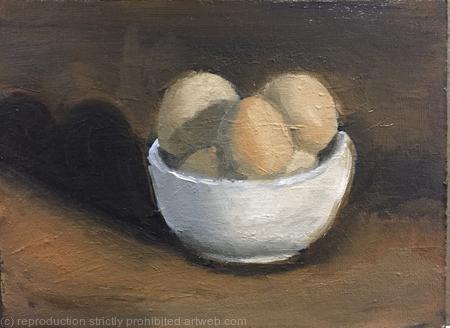 Bowl of eggs in warm light