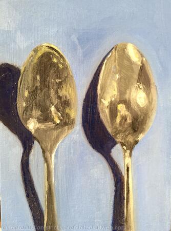 Both sides of a spoon