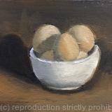 Bowl of eggs in warm light