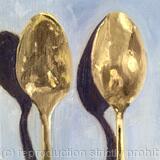 Both sides of a spoon