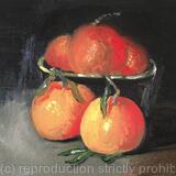 Clementines and a black clay bowl